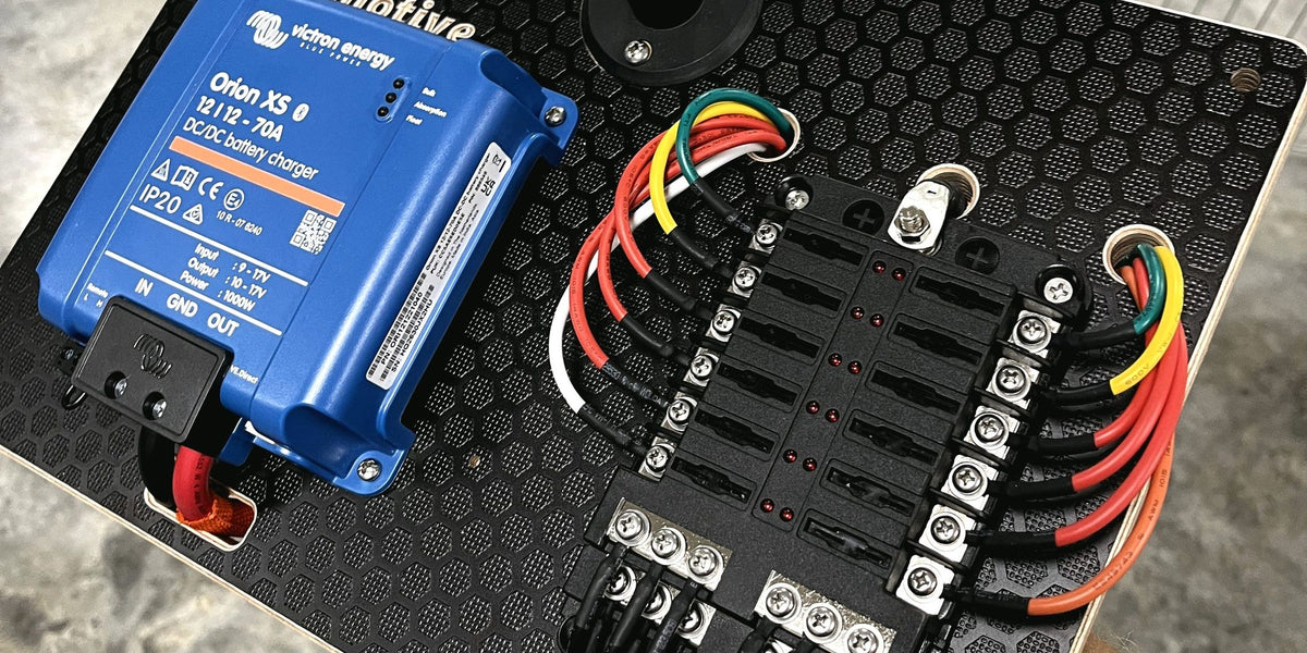 Rayne Automotive 12V install kit beside a pre-wired power board